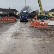 The Southdown team deliver a load of 20+ metre beams to a construction project, on a stretch trailer The Southdown team deliver a load of 20+ metre beams to a construction project, on a stretch trailer
